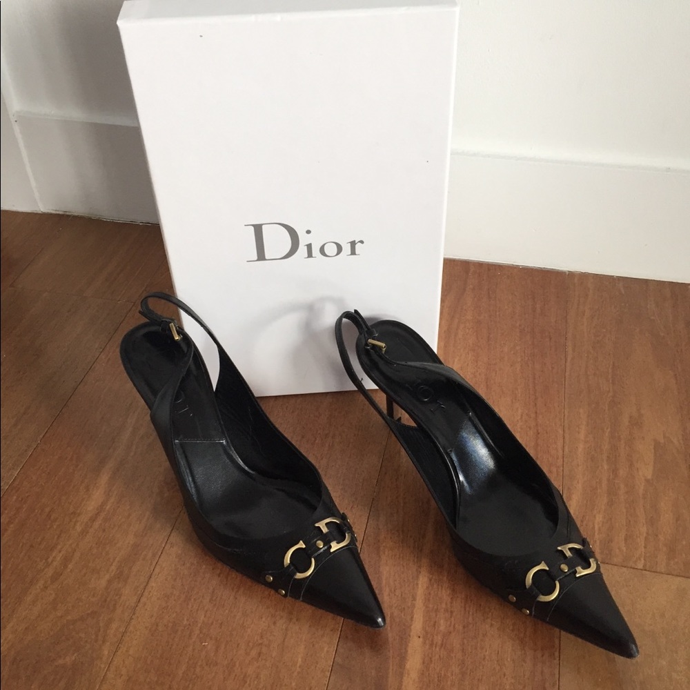 Christian Dior Black slung back pumps.